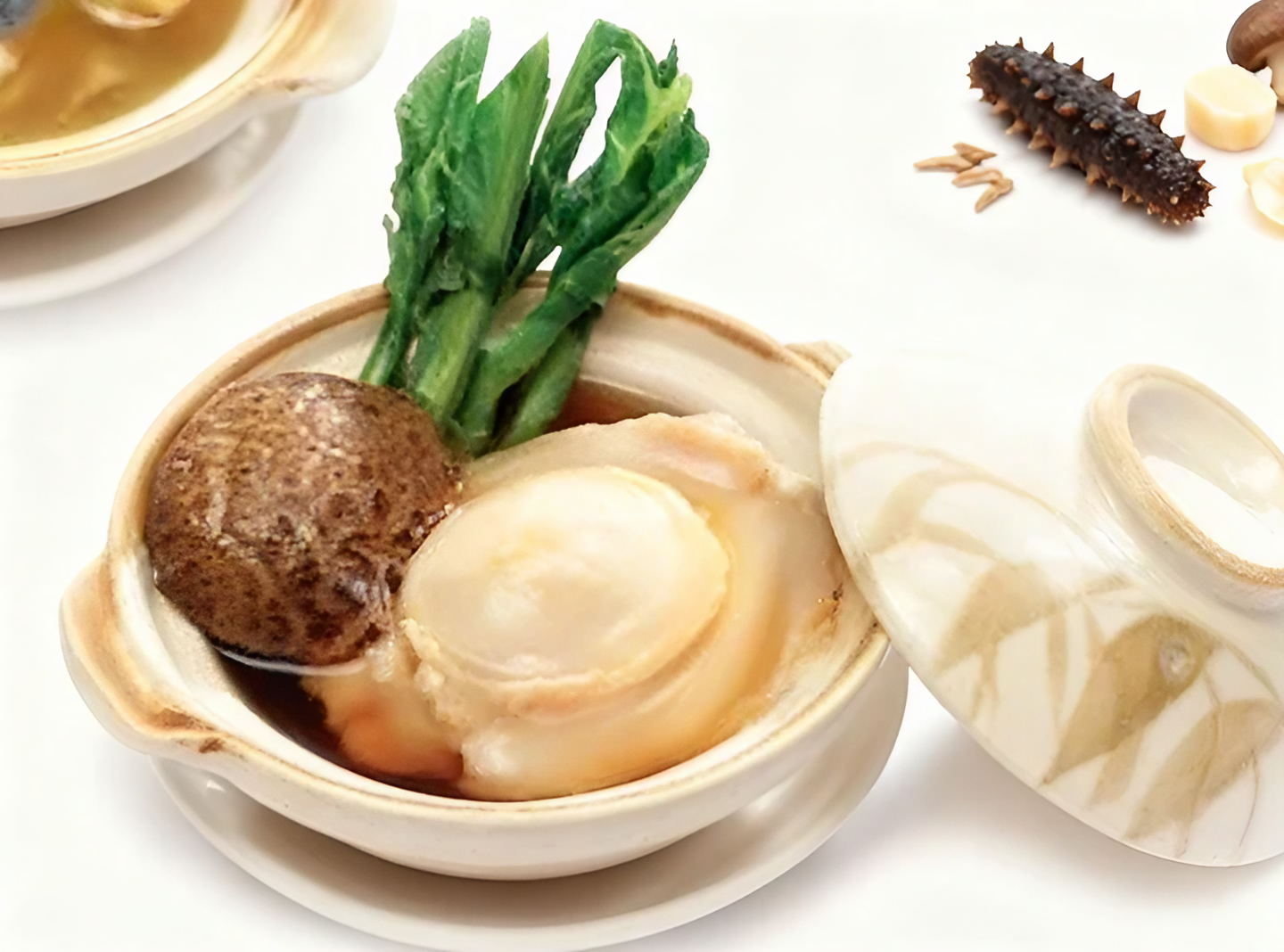 023 砂锅原粒鲍鱼 Braised Whole Abalone